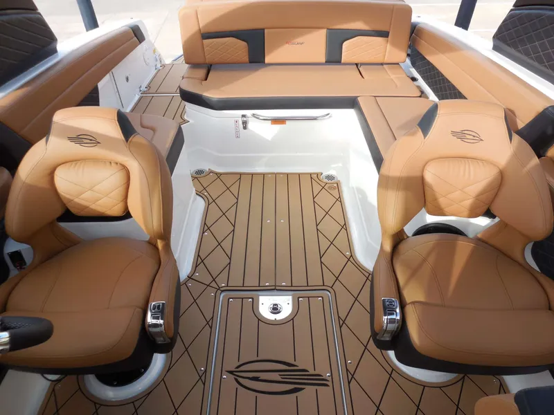 Slide: The Image of The image shows the interior of a 2026 Chaparral GTS 6 with elegant brown leather seating. - 27