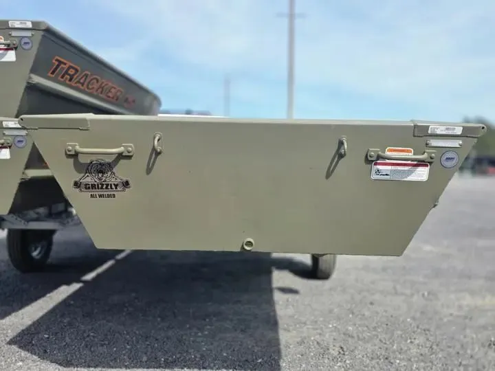 Slide: The Image of 2026 Tracker Grizzly 14 Jon boat on gravel surface. - 4