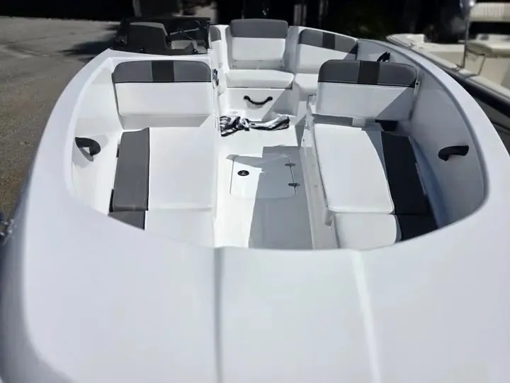 Slide: The Image of Interior view of 2026 Tahoe T16 boat with gray seating. - 7