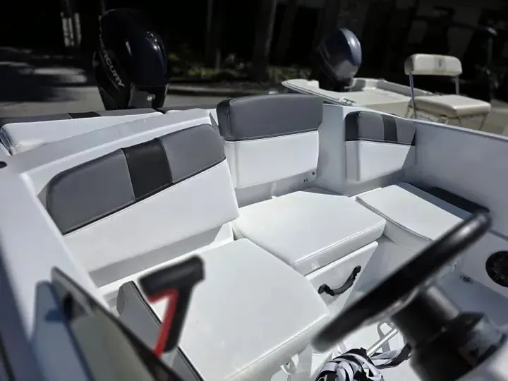 Slide: The Image of Interior of 2026 Tahoe T16 boat with gray and white seating. - 8