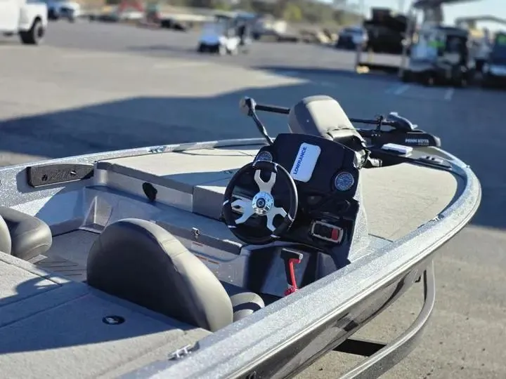 Slide: The Image of 2026 Nitro Z17 boat parked at the harbor. - 14