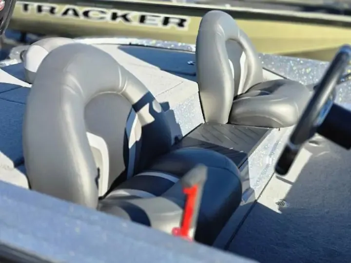 Slide: The Image of Interior of a 2026 Nitro Z17 boat with gray seats. - 16