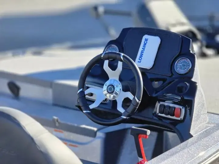 Slide: The Image of Steering wheel and dashboard of a 2026 Nitro Z17 boat. - 20