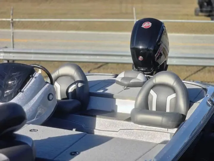 Slide: The Image of 2026 Nitro Z17 boat with gray seats and outboard motor. - 5