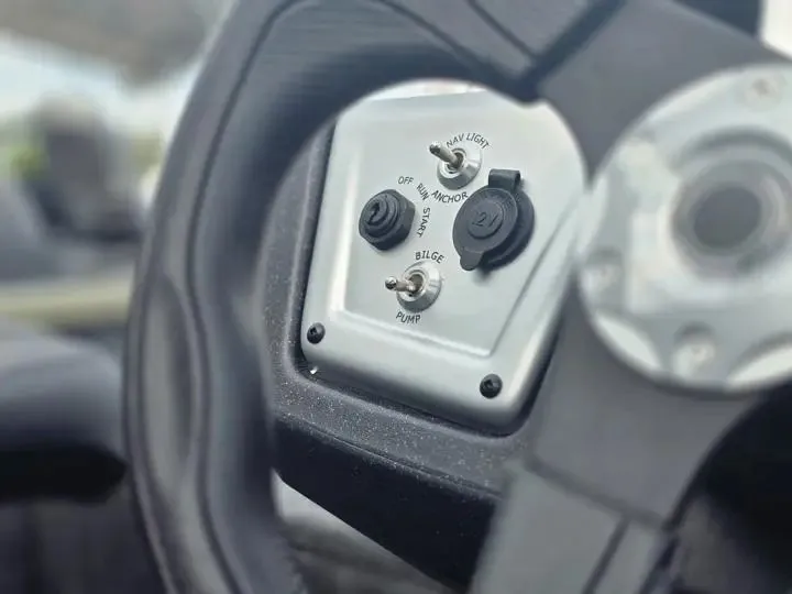 Slide: The Image of Close-up of the control panel on a 2026 Tracker Pro Team 175 Crappie Edition. - 15