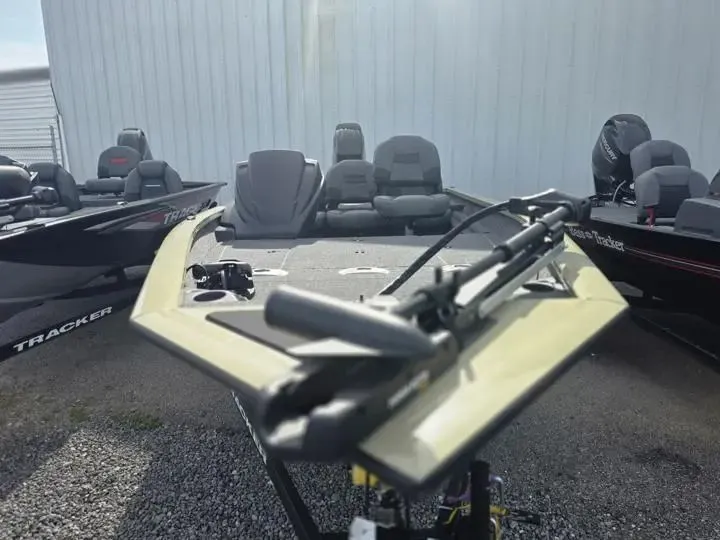 Slide: The Image of 2026 Tracker Pro Team 175 Crappie Edition boat on gravel surface. - 8