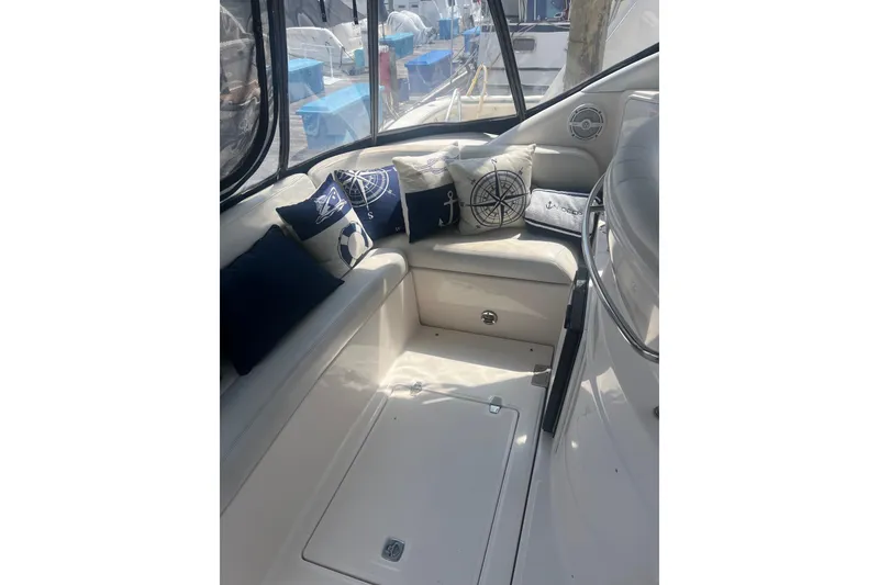 Slide: The Image of Interior of 2004 Regal Commodore 3860 yacht with nautical-themed cushions. - 6