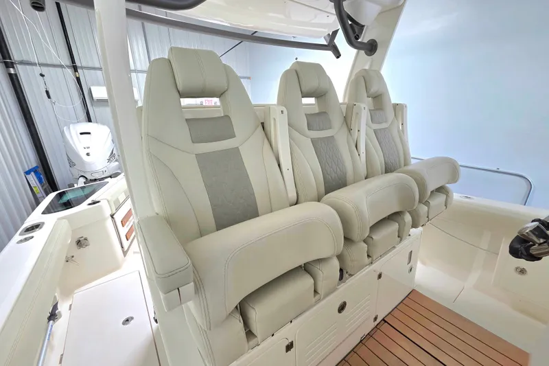 Slide: The Image of Luxurious seating on 2020 Solace 345 boat, featuring plush, ergonomic design and premium materials. - 18