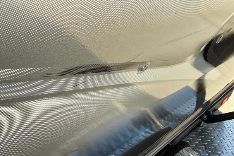 Slide: The Image of Close-up of 2022 G3 Angler V17 T boat's textured metallic surface. - 30