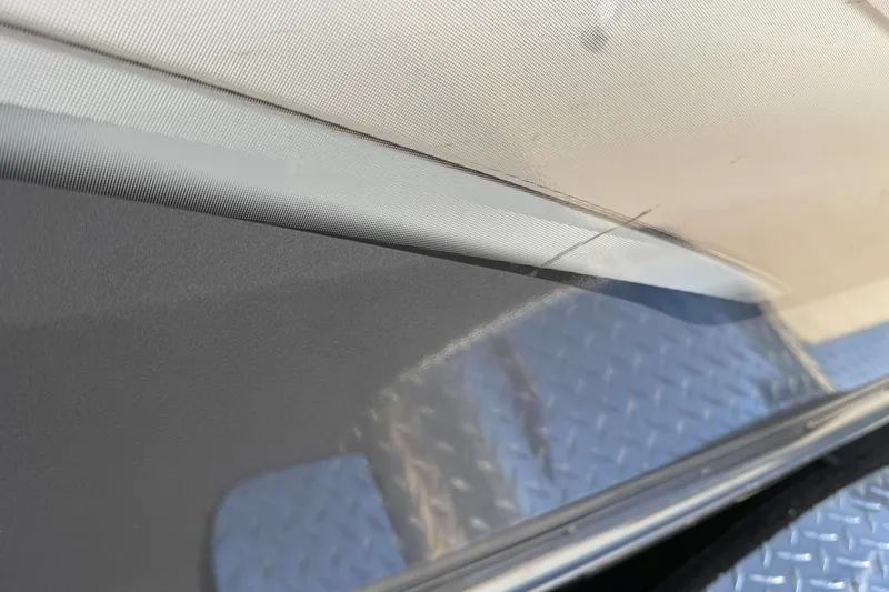 Slide: The Image of Close-up of 2022 G3 Angler V17 T boat's sleek exterior design. - 31