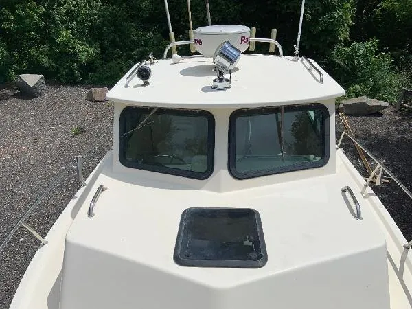 Slide: The Image of Parker Marine 2520 Deep Vee Sport Cabin 1998 - 5