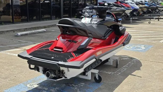 Slide: The Image of 2026 Yamaha WaveRunner FX Cruiser HO in red on parking lot. - 11