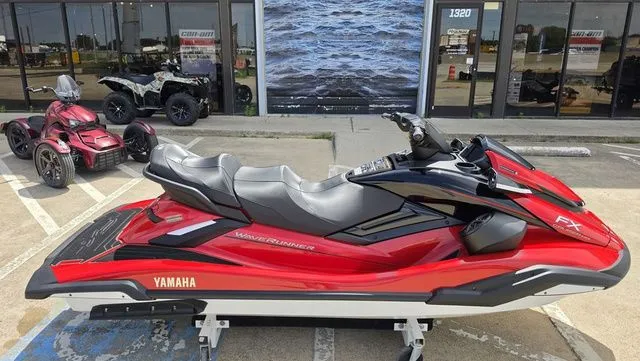 Slide: The Image of Red 2026 Yamaha WaveRunner FX Cruiser HO in front of a store. - 18