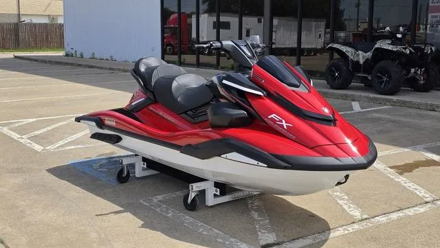 Slide: The Image of 2026 Yamaha WaveRunner FX Cruiser HO in red on parking lot. - 4