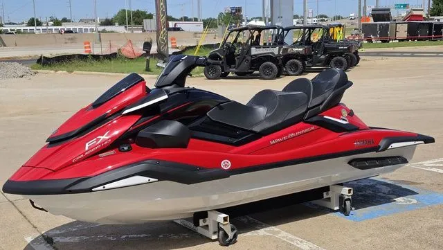 Slide: The Image of 2026 Yamaha WaveRunner FX Cruiser HO in red on parking lot. - 7