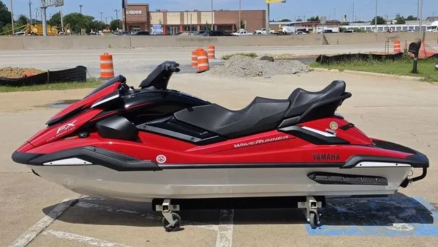 Slide: The Image of 2026 Yamaha WaveRunner FX Cruiser HO in red on parking lot. - 8