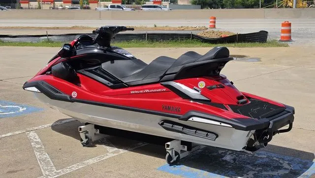 Slide: The Image of 2026 Yamaha WaveRunner FX Cruiser HO in vibrant red on parking lot. - 9