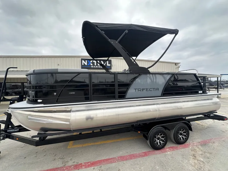 The Image of 2026 Trifecta 22 UL CS pontoon boat on trailer. - 1