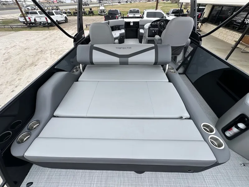 Slide: The Image of 2026 Trifecta 22 UL CS pontoon boat with gray seating. - 14