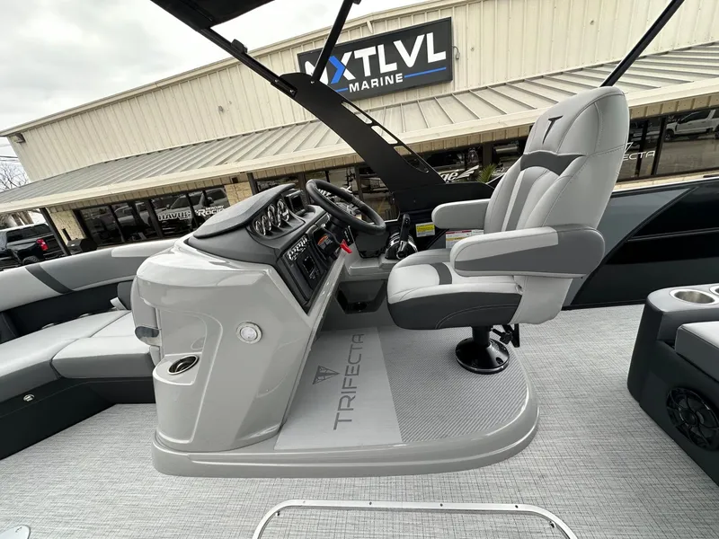 Slide: The Image of Interior of 2026 Trifecta 22 UL CS with helm console. - 21
