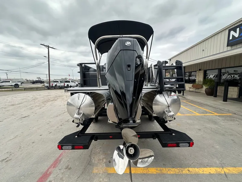 Slide: The Image of Trifecta 22 UL CS 2026 pontoon boat with outboard motor. - 4