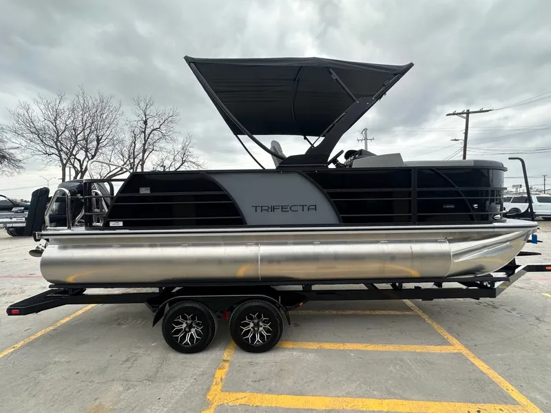 Slide: The Image of 2026 Trifecta 22 UL CS pontoon boat on trailer. - 6