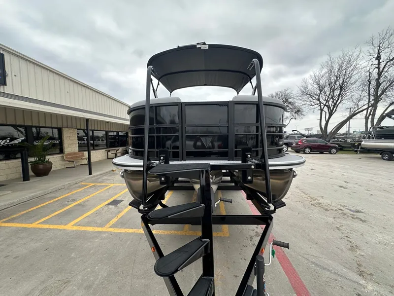 Slide: The Image of Trifecta 22 UL CS 2026 pontoon boat on trailer, side view. - 8