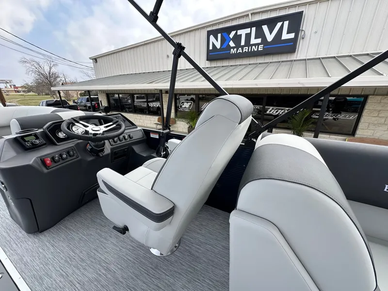 Slide: The Image of Interior of a 2026 Bennington 22 S STERN RADIUS boat at NXT LVL Marine. - 16
