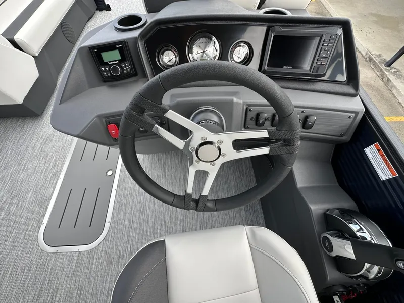 Slide: The Image of Steering wheel and dashboard of a 2026 Bennington 22 S STERN RADIUS. - 18