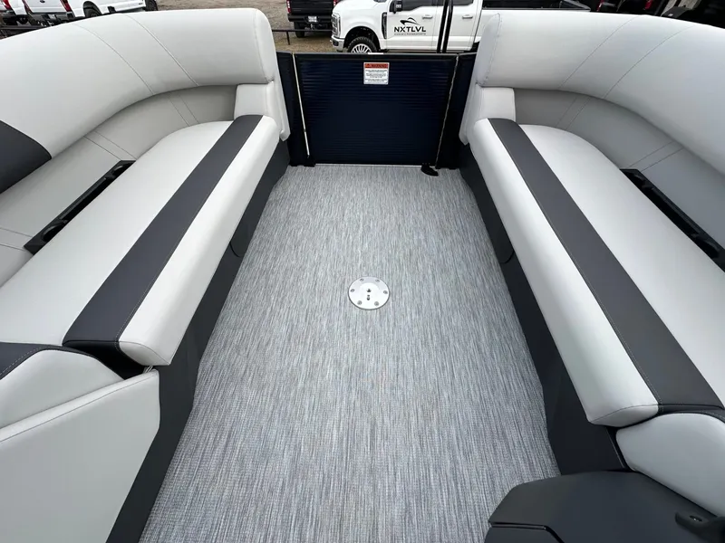 Slide: The Image of Interior of 2026 Bennington 22 S STERN RADIUS with gray upholstery. - 21