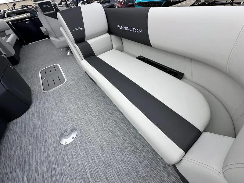 Slide: The Image of Interior of 2026 Bennington 22 S STERN RADIUS with gray and black seating. - 26