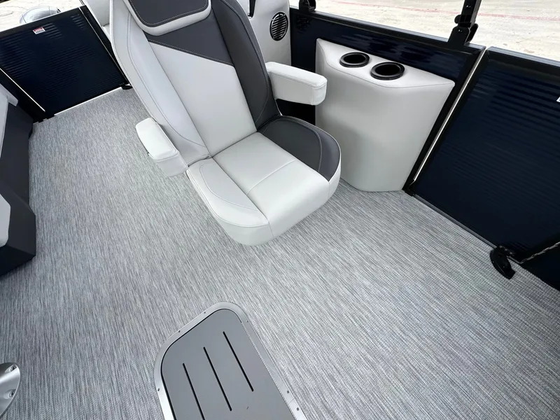 Slide: The Image of Interior of 2026 Bennington 22 S STERN RADIUS with gray carpet and seat. - 29