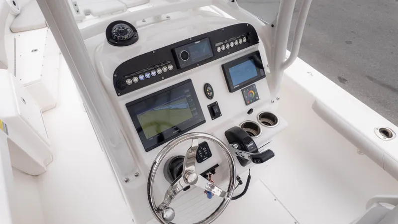 Slide: The Image of Control console of Everglades 243 Center Console boat, year 2020. - 17