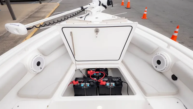 Slide: The Image of Everglades 243 Center Console 2020 with open battery compartment and speakers. - 23