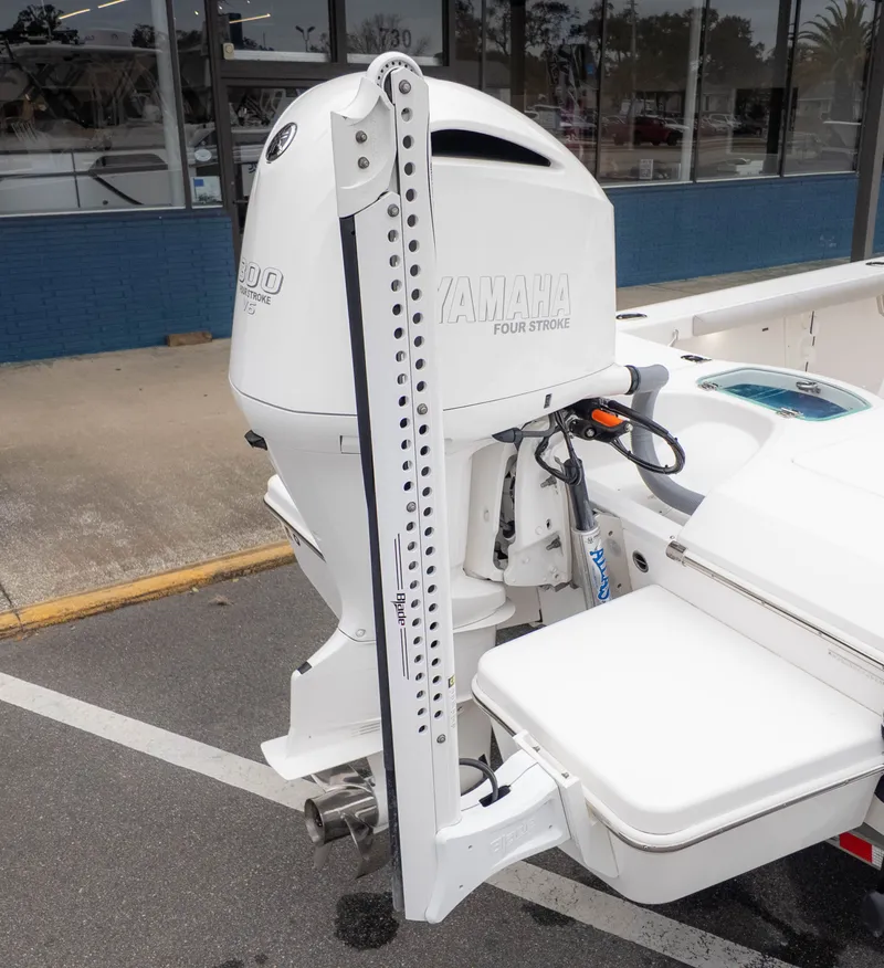 Slide: The Image of Yamaha outboard motor on a 2020 Everglades 243 Center Console boat. - 6