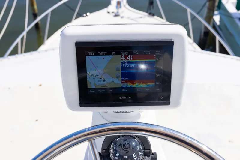 Slide: The Image of Garmin navigation display on 1997 Tiara Yachts 3500 Express boat dashboard. - 17