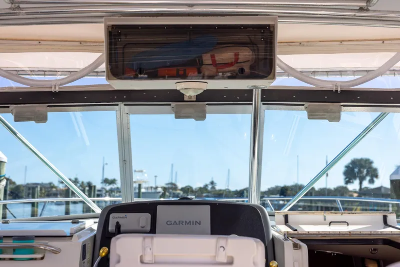 Slide: The Image of Interior view of 1997 Tiara Yachts 3500 Express with Garmin navigation system. - 26