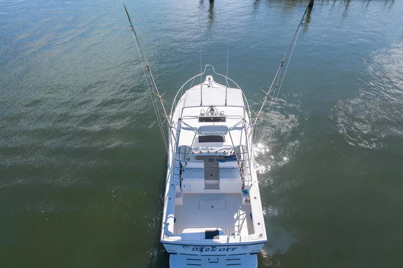 Slide: The Image of Aerial view of 1997 Tiara Yachts 3500 Express on calm water. - 9