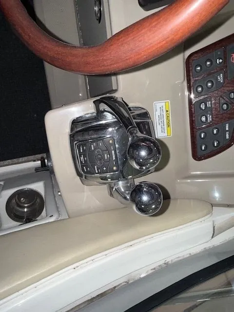 Slide: The Image of Control console of a 2009 Sea Ray Sundancer 310 boat. - 8