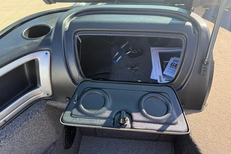 Slide: The Image of 2020 Lund 1875 Impact XS boat dashboard with open glove compartment. - 25