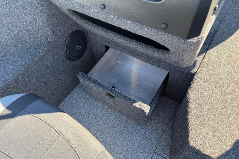 Slide: The Image of 2020 Lund 1875 Impact XS boat interior with open storage compartment. - 26