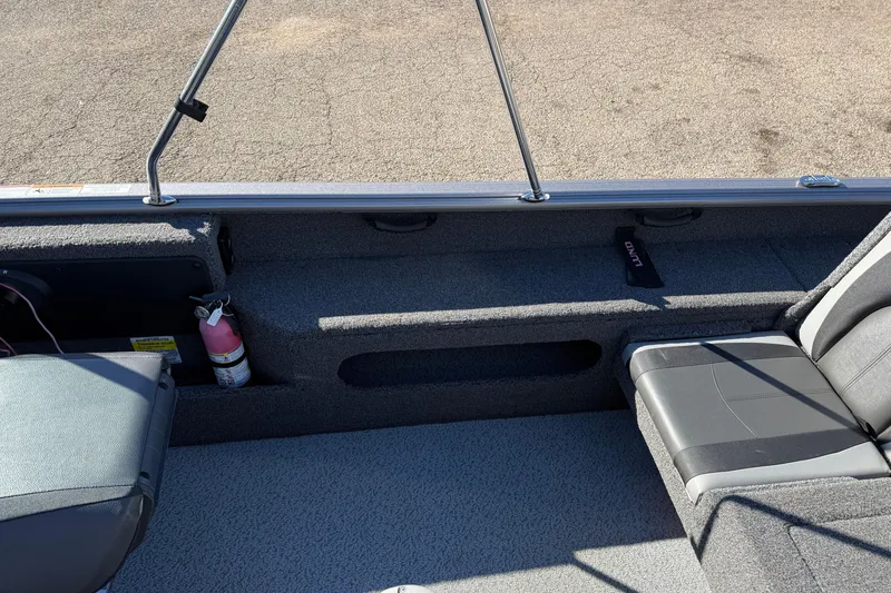 Slide: The Image of 2020 Lund 1875 Impact XS boat interior with seating and fire extinguisher. - 28