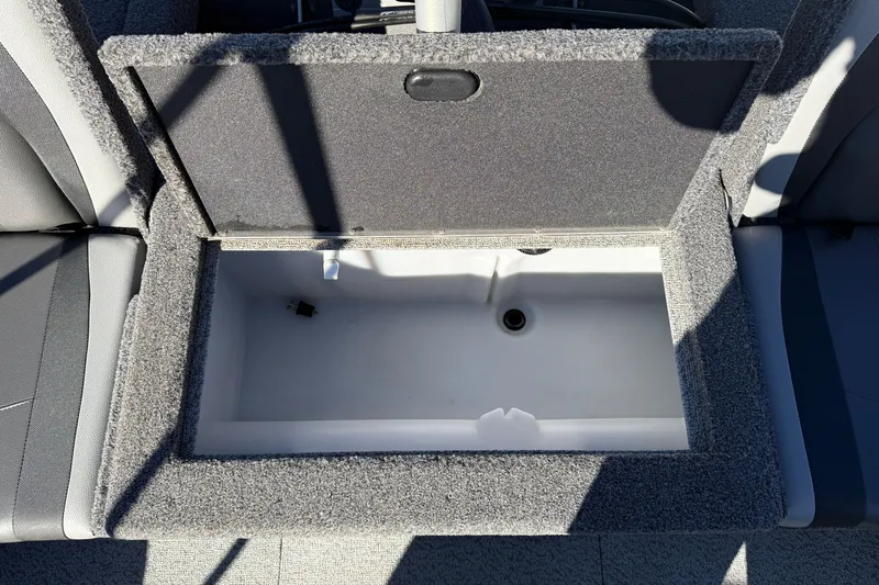 Slide: The Image of Open storage compartment in 2020 Lund 1875 Impact XS boat interior. - 31