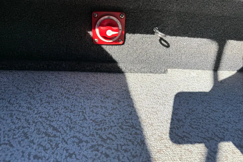 Slide: The Image of Red switch on 2020 Lund 1875 Impact XS boat interior. - 33