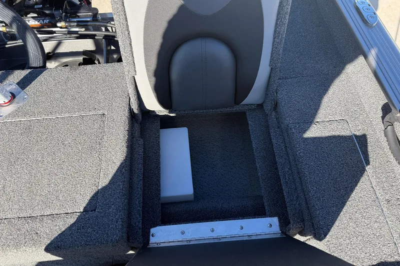 Slide: The Image of 2020 Lund 1875 Impact XS boat interior with storage compartment and seating. - 34