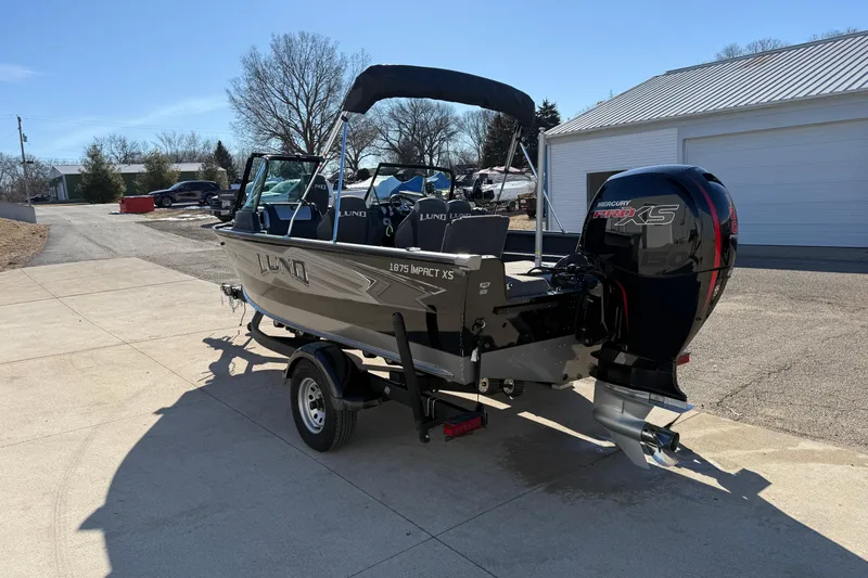 Slide: The Image of 2020 Lund 1875 Impact XS boat with Mercury Pro XS engine on a trailer. - 5