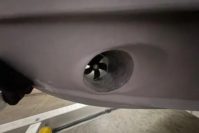 Slide: The Image of 2022 Cutwater C-30 Sedan boat thruster detail, showcasing propeller design. - 27