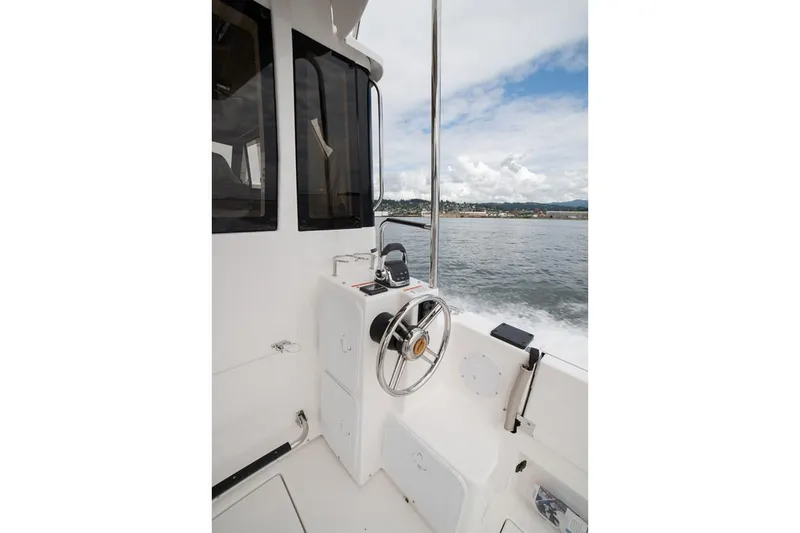 Slide: The Image of Manufacturer Provided Image: 2022 Cutwater C-30 Sedan boat helm station with ocean view. - 4