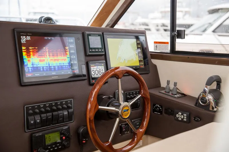 Slide: The Image of Manufacturer Provided Image: 2022 Cutwater C-30 Sedan helm with advanced navigation and control systems. - 8