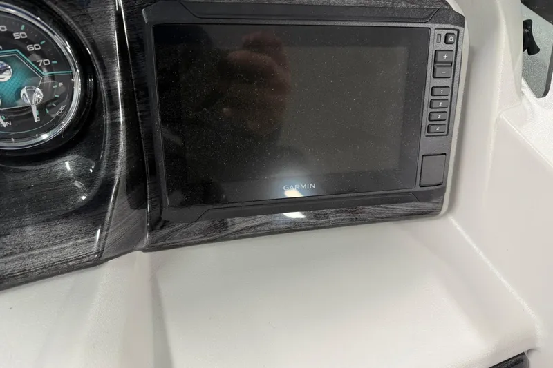 Slide: The Image of Dashboard of 2026 Avalon LSZ Quad Lounge with Garmin display and speedometer. - 13